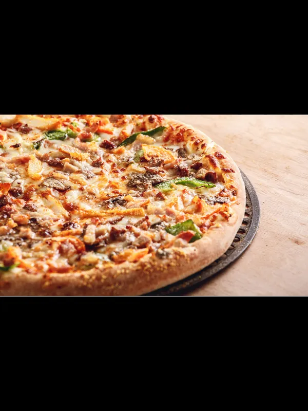 Pizza artisanale Don Camillo n°7 cuite au feu de bois